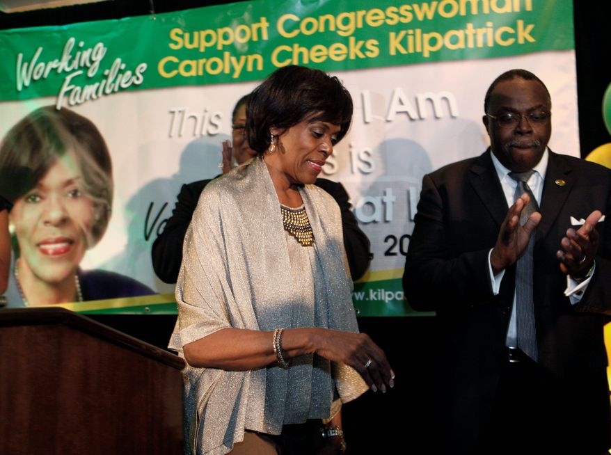Associated Press
U.S. Rep. Carolyn Cheeks Kilpatrick, Michigan Democrat, leaves after delivering her concession speech Wednesday morning. Mrs. Cheeks Kilpatrick lost her bid for an eighth term on Tuesday, becoming the sixth incumbent to lose a bid so far this year.