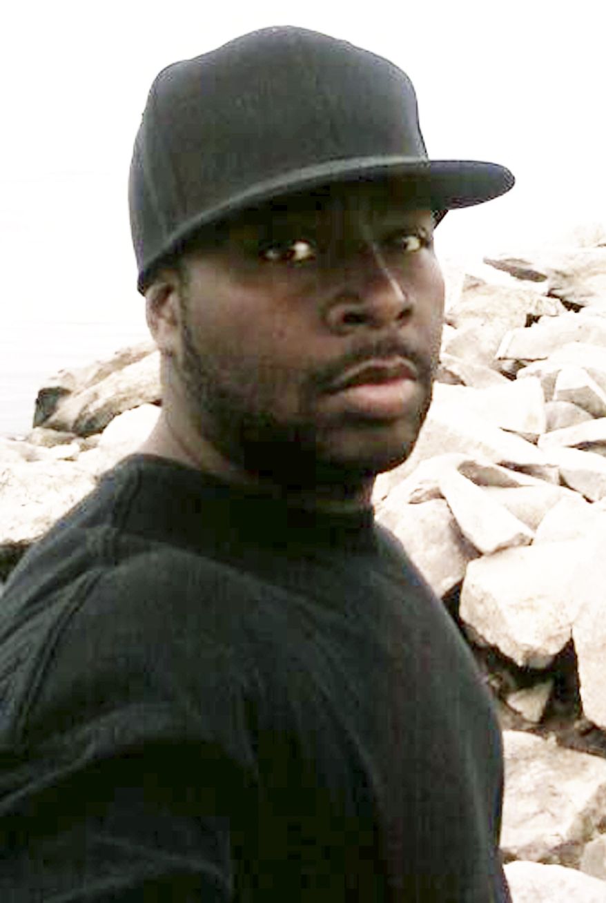 Omar Thornton, who police say killed eight people and wounded two before turning the gun on himself, is pictured in a cell-phone photo provided by Kristi Hannah, his girlfriend. (AP Photo/Kristi Hannah)