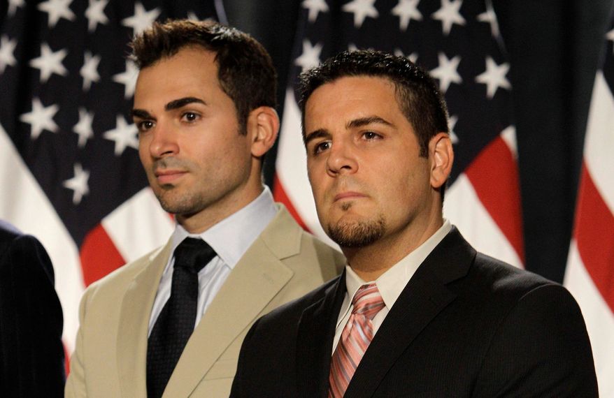 Paul Katami (left) and Jeff Zarrillo appear at a news conference in San Francisco on Wednesday. Mr. Katami and Mr. Zarrillo were one of the two same-sex couples who were plaintiffs in a federal court case on California's same-sex marriage ban. (Associated Press)