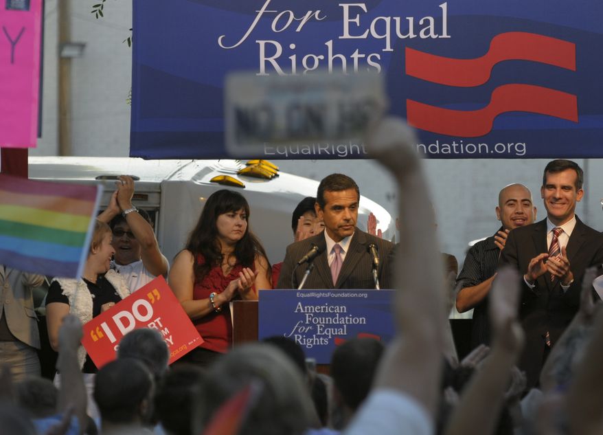 Los Angeles Mayor Antonio Villaraigosa, center, speaks at a public rally on Wednesday, Aug. 4, 2010, in West Hollywood, Calif. Gay rights supporters turned out in droves to celebrate a federal judge's overturning of California's Proposition 8, a same-sex marriage ban, a landmark case which could eventually land before the U.S. Supreme Court to decide if gays have a constitutional right to marry in America. (AP Photo/Adam Lau)