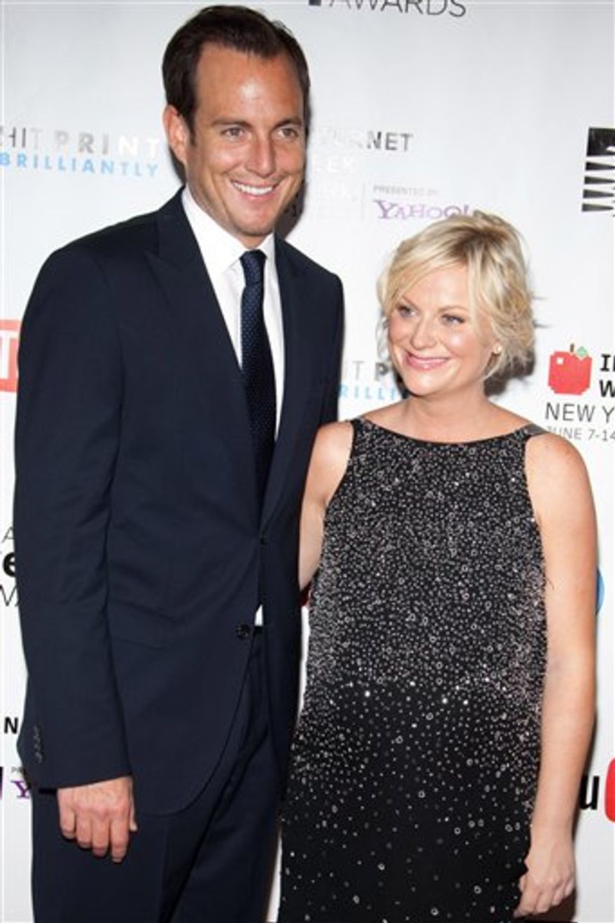 In this June 14, 2010 photo, Will Arnett and Amy Poehler arrive to the 14th Annual Webby Awards in New York. (AP Photo/Charles Sykes)