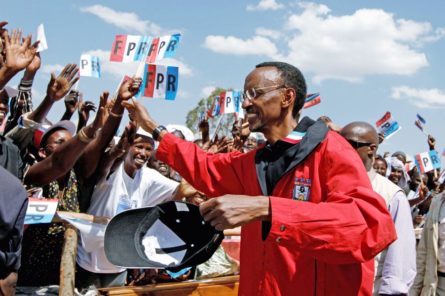 President Paul Kagame speaks to Rwandans on a campaign stop in Nyagatare. Mr. Kagame is thought to be all but assured of re-election, but opposition leaders say they've been barred from participating. (Associated Press)