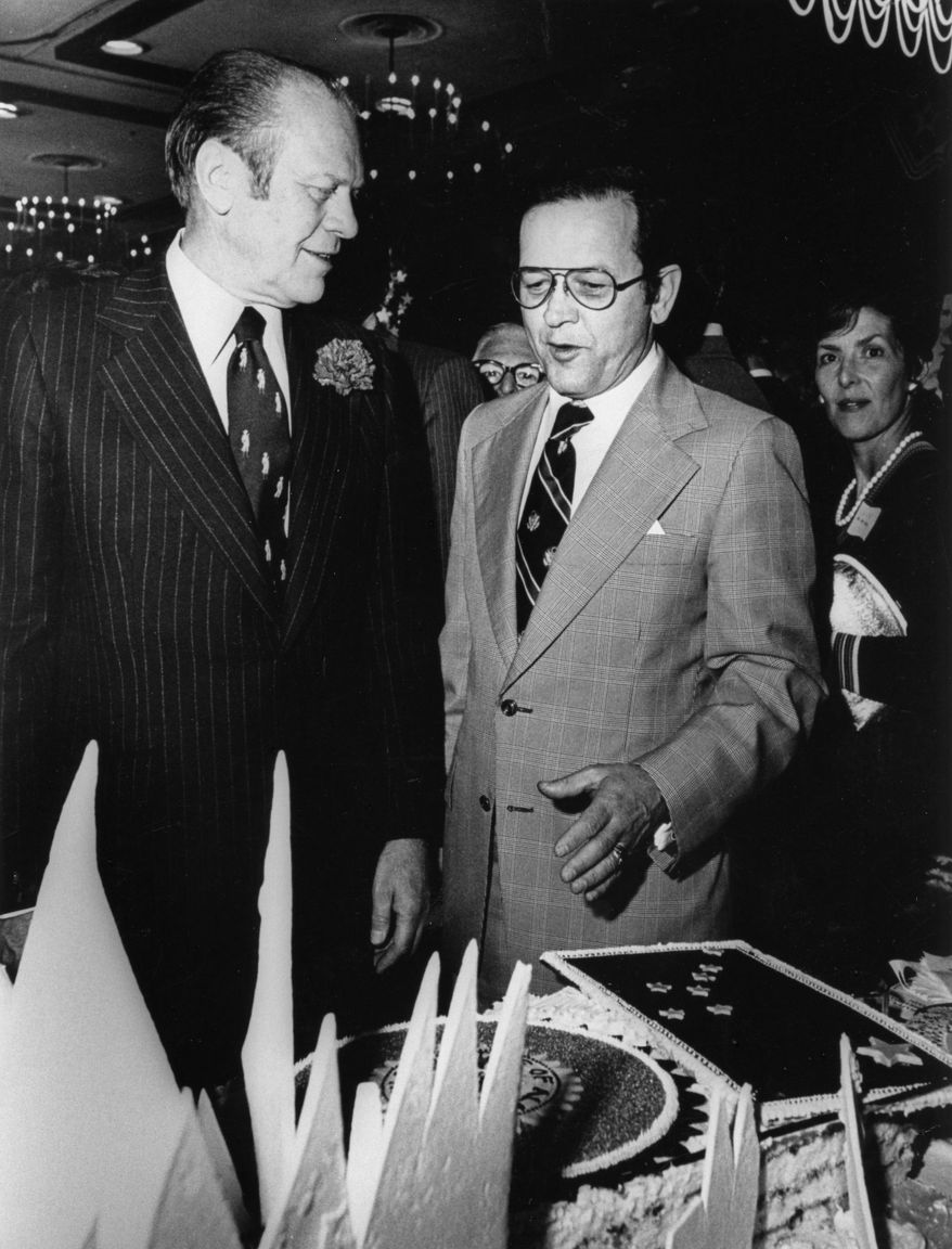 In this 1973 photo, President Gerald Ford stands beside Ted Stevens at Stevens' 50th birthday in Anchorage, Alaska. Stevens, an uncompromising advocate for Alaska for four decades who delivered scores of expensive projects to one of the nation's most sparsely populated states, died in a plane crash on Monday, Aug. 9, 2010 at the age of 86. Family spokesman Mitch Rose says Stevens was among the victims of a crash outside Dillingham, Alaska about 325 miles southwest of Anchorage. (AP Photo/The Anchorage Daily News)