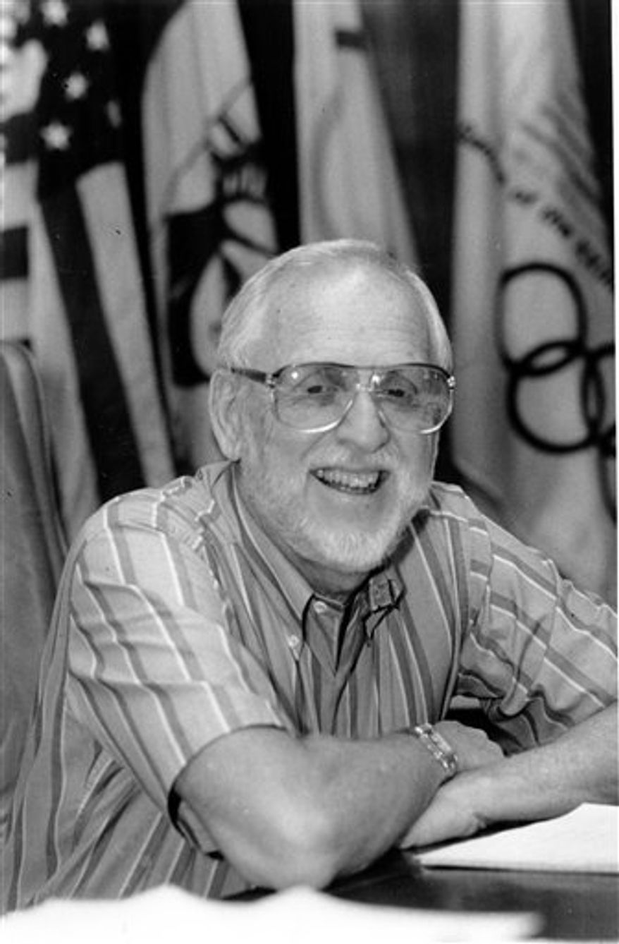 Television executive producer David Wolper poses in his office in Los Angeles, Calif., in Aug. 1987. Wolper, whose 1977 miniseries "Roots" became a landmark in television history, has died at the age of 82. Wolper died peacefully in his Beverly Hills home Tuesday evening while watching television with his wife Gloria. Wolper died of congestive heart disease and complications of Parkinson's disease. (AP Photo/Mark Terrill)