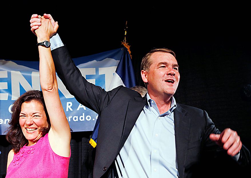 Senator Michael Bennet, D-Colo., celebrates with his wife Susan Dagget after winning the Democratic primary at an election party on Tuesday, Aug. 10, 2010 in Denver. (AP Photo/Ed Andrieski)