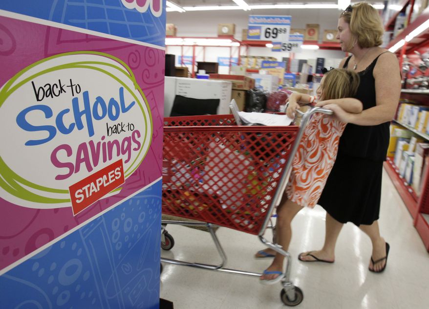 In this Aug. 1, 2010, Ann Brown, right, and her daughter Julie Anne, 5, shop for school supplies at a Staples store in Little Rock, Ark. Retail sales managed a modest increase in July after two consecutive declines, but the strength was concentrated in higher sales of autos and gasoline. Most other retailers saw their sales fall. (AP Photo/Danny Johnston)