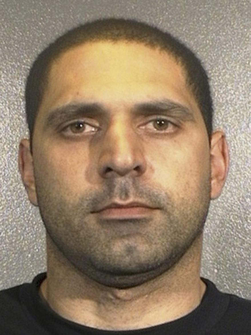 ** FILE ** This undated file photo released by the Arlington, Va., County Police Department shows Elias Abuelazam. The Israeli citzen suspected in a three-state stabbing spree is due in court in Atlanta for an extradition hearing after he was arrested at the airport before flying out of the country. (AP Photo/Arlington County Police Department, File)