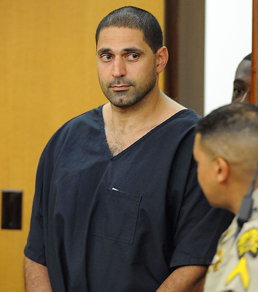Elias Abuelazam, 33, attends an extradition hearing in Fulton County Superior Court on Friday, Aug. 13, 2010, in Atlanta. Abuelazam, an Israeli citizen, is suspected in several stabbing attacts in Michigan, Ohio and Virginia. He was arresting at Atlanta Hartsfield Jackson International Airport before boarding a flight to Israel.(AP Photo/Erik S. Lesser, Pool)