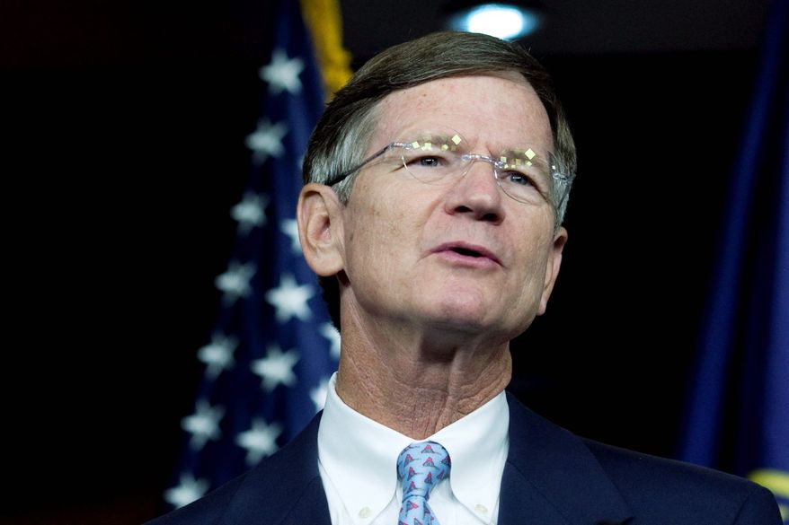 ASSOCIATED PRESS
AN OUNCE OF PREVENTION: Rep. Lamar Smith, Texas Republican, wants a new policy for illegals involved in DUI cases.