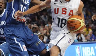 ASSOCIATED PRESS United States guard Stephen Curry, right, drives to the basket as France  guard Yannick Bokolo defends during the fourth quarter of an exhibition basketball game Sunday, Aug. 15, 2010, at Madison Square Garden in New York. The U.S. squad won 86-55.