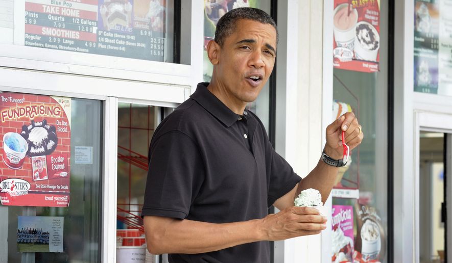 President Obama stops for ice cream with first lady Michelle Obama and their daughter Sasha (not pictured) before departing Panama City Beach, Fla., on Sunday, Aug. 15, 2010. The Obamas spent the weekend in Florida. (AP Photo/Susan Walsh)