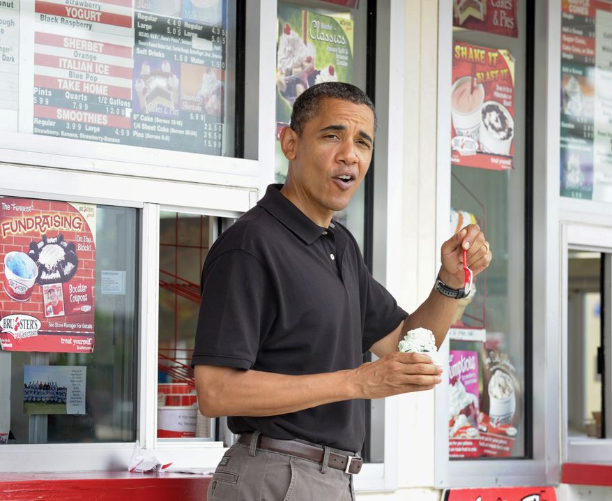President Obama stops for ice cream with first lady Michelle Obama and their daughter Sasha (not pictured) before departing Panama City Beach, Fla., on Sunday, Aug. 15, 2010. The Obamas spent the weekend in Florida. (AP Photo/Susan Walsh)