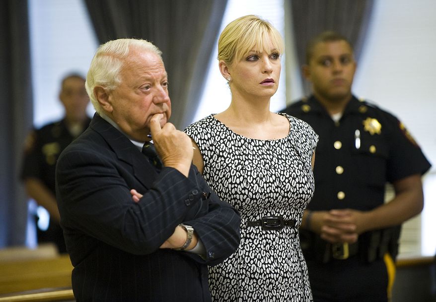 Former U.S. figure skating champion Nicole Bobek stands with her lawyer, Sam DeLuca, during her sentencing hearing at the Hudson County Superior Court in Jersey City, N.J., on Monday, Aug. 16, 2010. She received five years' probation for her role in a crystal methamphetamine ring. (AP Photo/Reena Rose Sibayan, Pool)