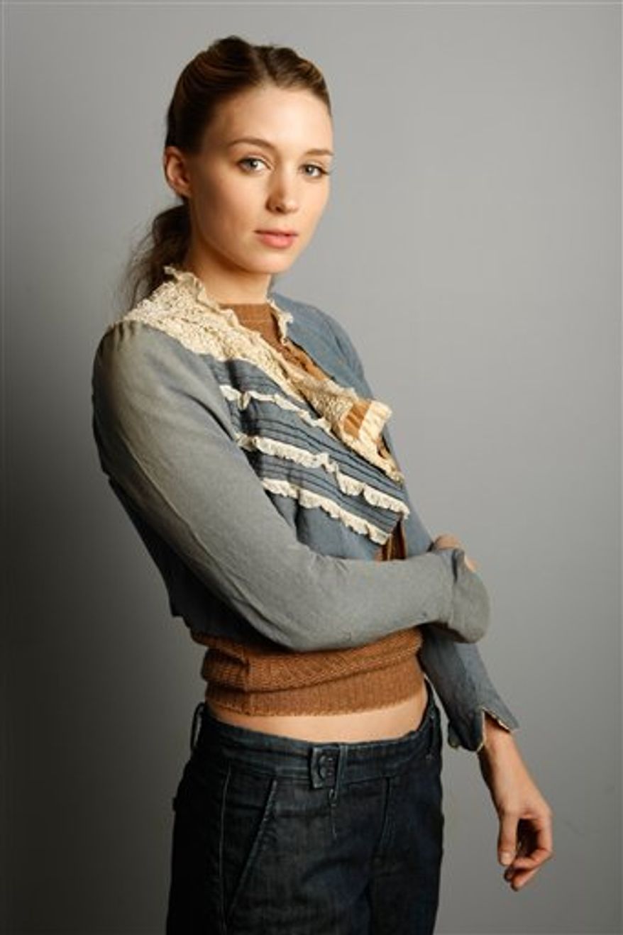 FILE - In this Jan. 19, 2009 file photo, actress Rooney Mara of "The Winning Season" poses for a portrait at the Gibson Guitar Lounge during the Sundance Film Festival in Park City, Utah. (AP Photo/Mark Mainz, file)