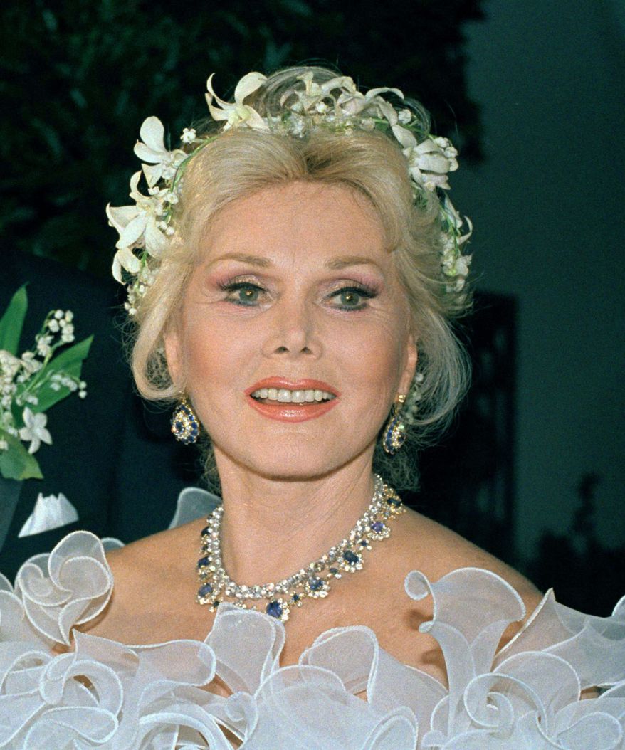 In this Aug. 15, 1986, file photo, actress Zsa Zsa Gabor is shown Los Angeles. Ms. Gabor's publicist says the actress is being returned to a hospital because of complications in her recuperation from a broken hip. (AP Photo/File)