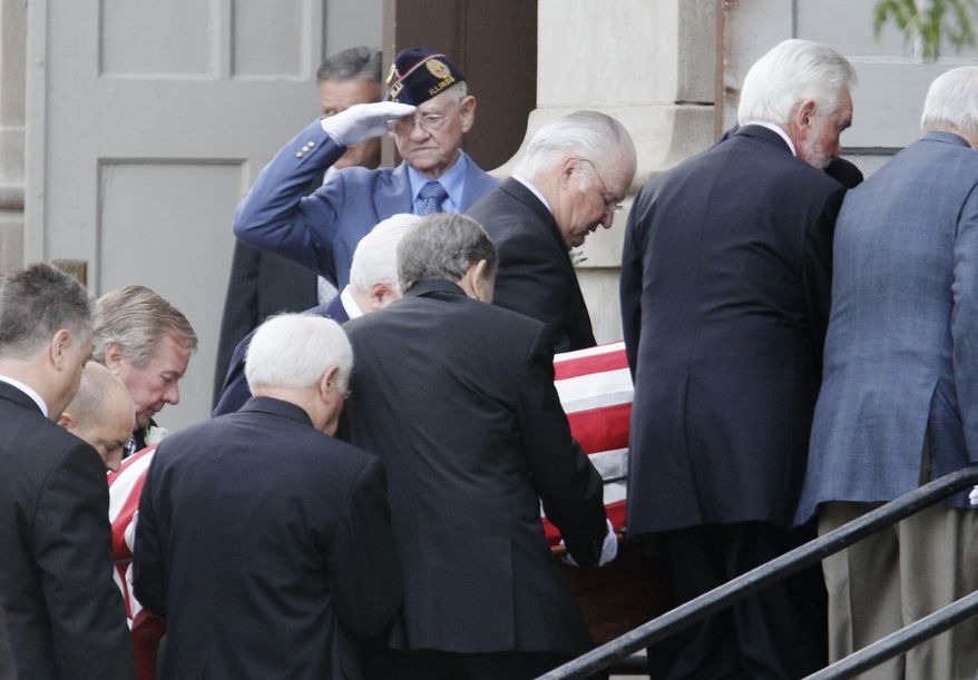 Pallbearers carry the casket of former Rep. Dan Rostenkowski into St. Stanislaus Kostka Church in Chicago on Tuesday, Aug. 17, 2010. Hundreds of mourners, including some former congressional colleagues and the city's mayor, packed the church to pay final tribute to the longtime politician. (AP Photo/M. Spencer Green)