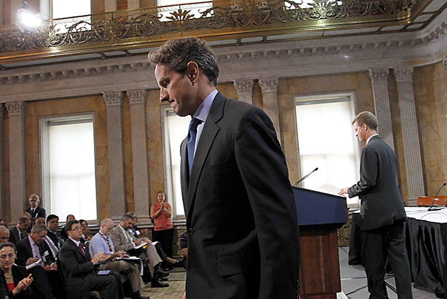 Treasury Secretary Timothy Geithner, left, walks off stage after addressing the Conference on the Future of Housing Finance, Tuesday, Aug. 17, 2010, at the Treasury Department in Washington, Tuesday, Aug. 17, 2010. Taking the podium at right is Housing and Urban Development Secretary Shaun Donovan. (AP Photo/Pablo Martinez Monsivais)