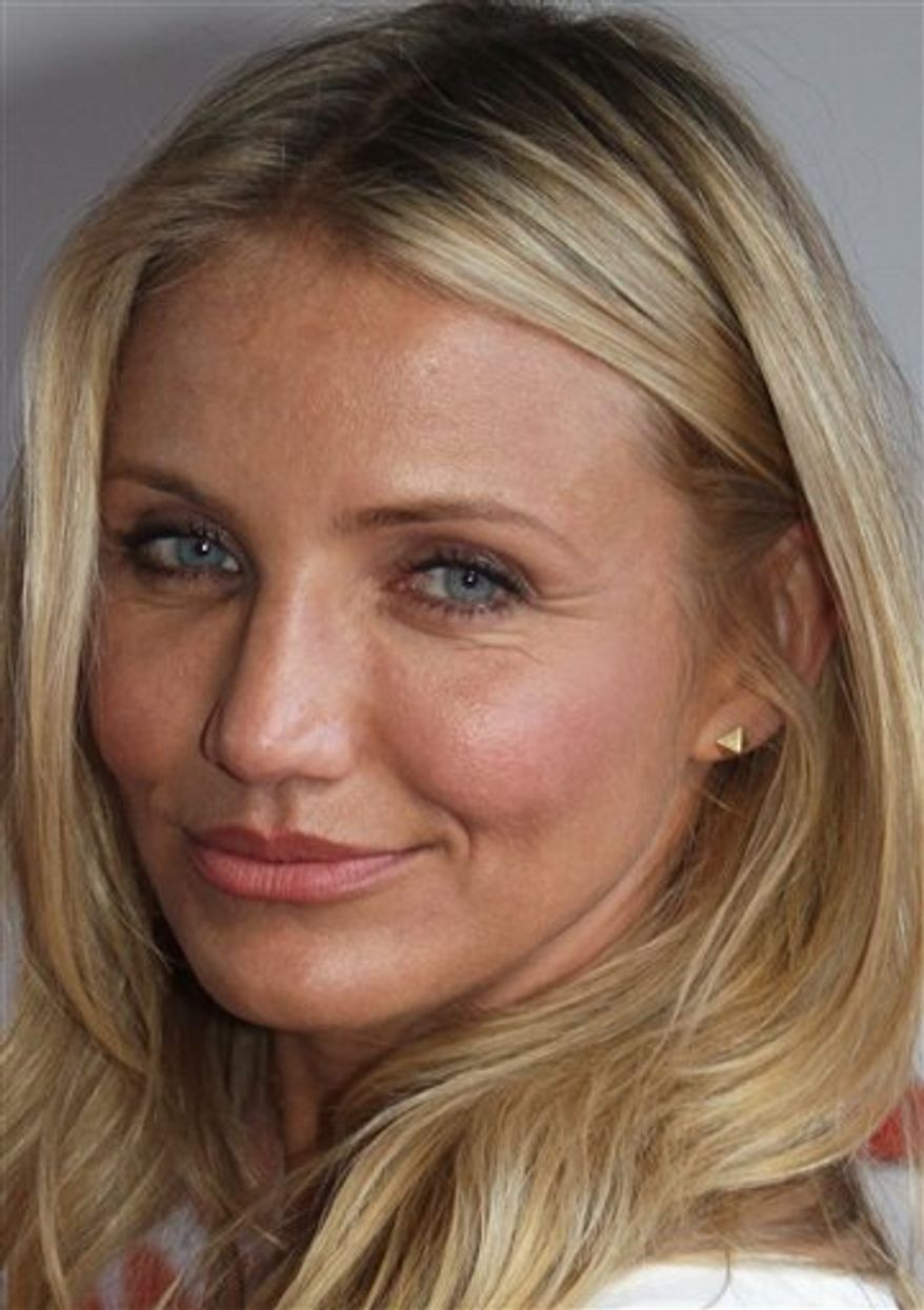 FILE - In this July 23, 2010 file photo, US actor Cameron Diaz poses on the red carpet to promote the film 'Knight and Day' in Bordeaux, Southwestern France. If you're looking for Cameron Diaz, Julia Roberts or Jessica Biel online, look out! The movie stars top the latest list of the most dangerous celebrities to search for online, according to new research by computer-security software maker McAfee Inc. (AP Photo/Bob Edme)