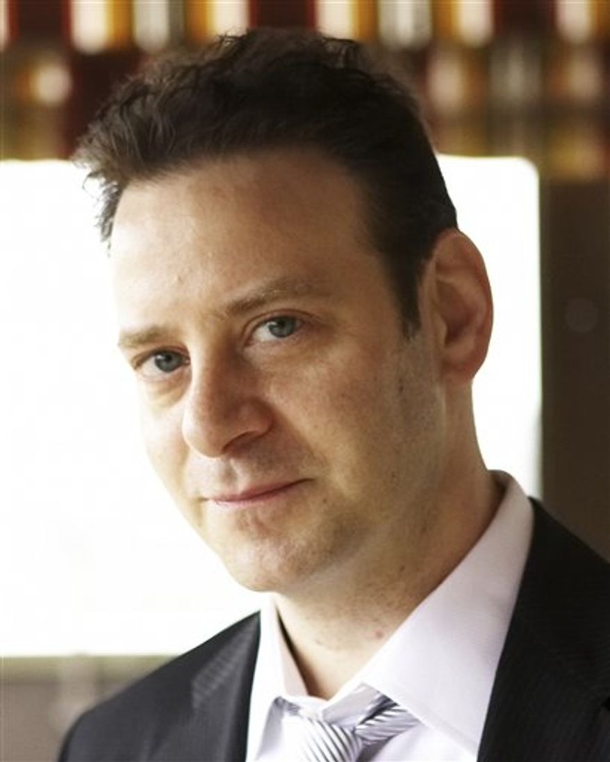 This April 2009 photo provided by Craig Paulson shows Mark Kennedy. Kennedy, who previously worked for The Associated Press for 13 years, is rejoining the news agency as its theater and pop culture writer. (AP Photo/Craig Paulson) NO SALES
