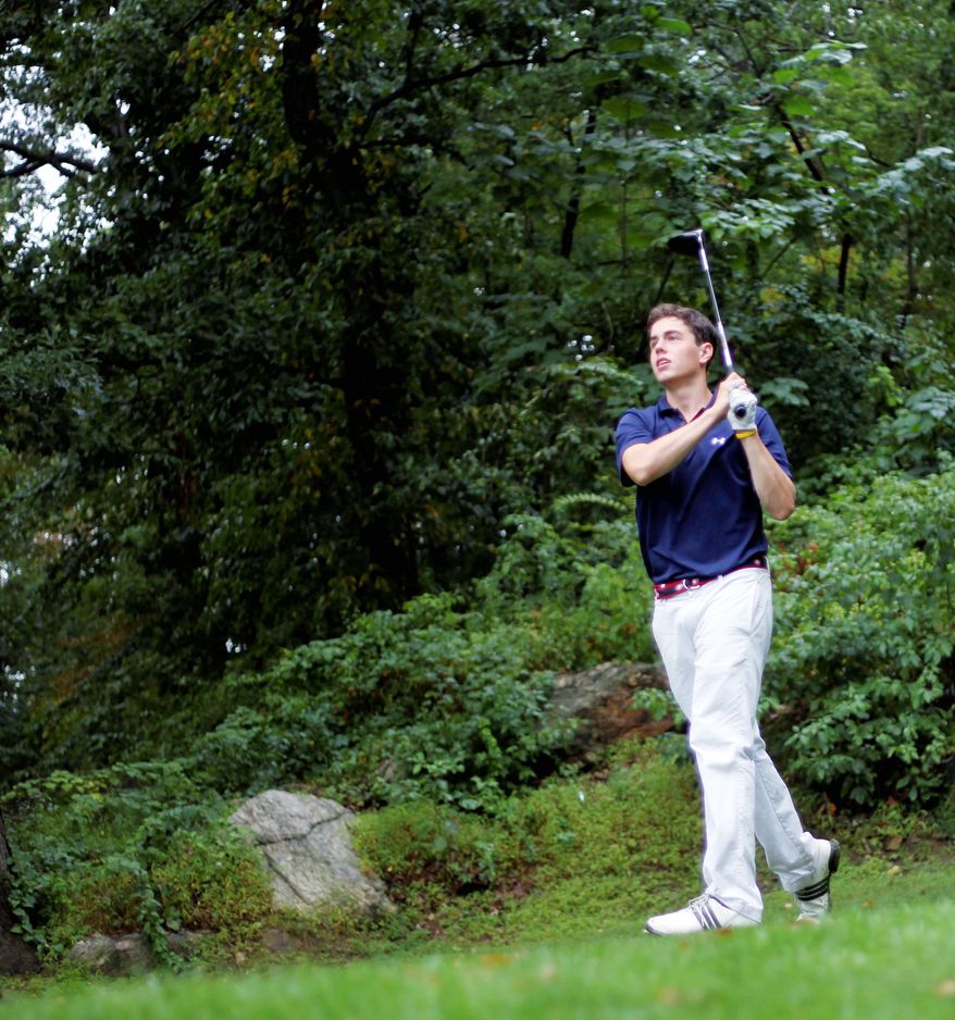 Kris Talgo chips his ball at Saxon Woods. The number of U.S. golfers is down from its peak of 30 million in 2005 to 27.1 million in 2009. (Associated Press)