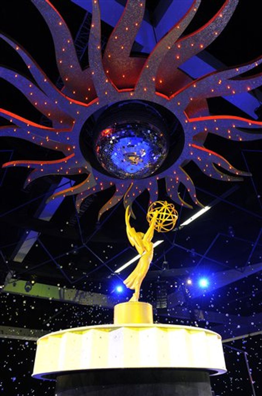 An Emmy statue is displayed inside the Governors Ball following Sunday's 62nd Primetime Emmy Awards, during Emmy Awards Press Preview Day in Los Angeles, Wednesday, Aug. 25, 2010. (AP Photo/Chris Pizzello)