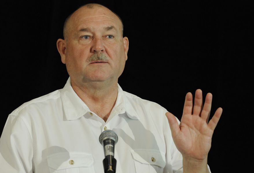 Retired Coast Guard Adm. Thad Allen gives an update on efforts to stop the oil spill in the Gulf of Mexico during a briefing at BP headquarters Tuesday, Aug. 3, 2010, in Houston. (AP Photo/Pat Sullivan)