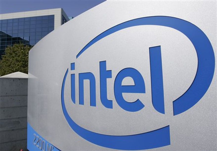 File - In this Sept. 5, 2006 file photo, the Intel Corp. company logo is displayed at its headquarters in Santa Clara, Calif. The big chip-maker Intel Corp. is cutting its sales forecast for the current quarter, adding fresh evidence Friday, Aug. 27, 2010, that a rickety economy is putting a damper on the back-to-school shopping season. (AP Photo/Paul Sakuma, file)