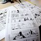 &quot;Beetle Bailey&quot; comic strips sit on a desk in the studio of creator Mort Walker in Stamford, Conn., on Aug. 16. The long-running strip will mark its 60th anniversary on Saturday. It began running in 12 newspapers in September 1950, and now appears in 1,800. (Associated Press)