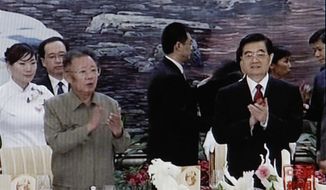 In this image made on Monday, Aug. 30, 2010, from China Central Television footage, North Korea&#x27;s Kim Jong-il (third from left) applauds with Chinese President Hu Jintao (right) during a banquet in Changchun, in northeast China&#x27;s Jilin province, on Friday, Aug. 27, 2010. (AP Photo/CCTV via APTN)