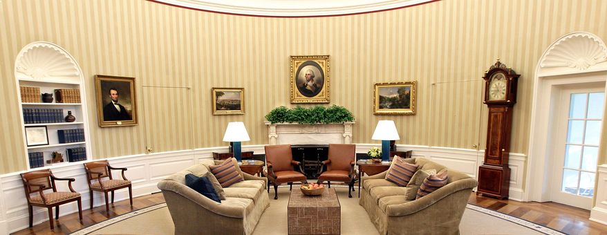 ASSOCIATED PRESS PHOTOGRAPHS
A wide-angle presidential view of the renovated Oval Office shows new carpeting, drapes, wallpaper and furniture. A pair of former President George W. Bush's fireside armchairs have been reupholstered in caramel-colored leather, and there are two new custom-made sofas.