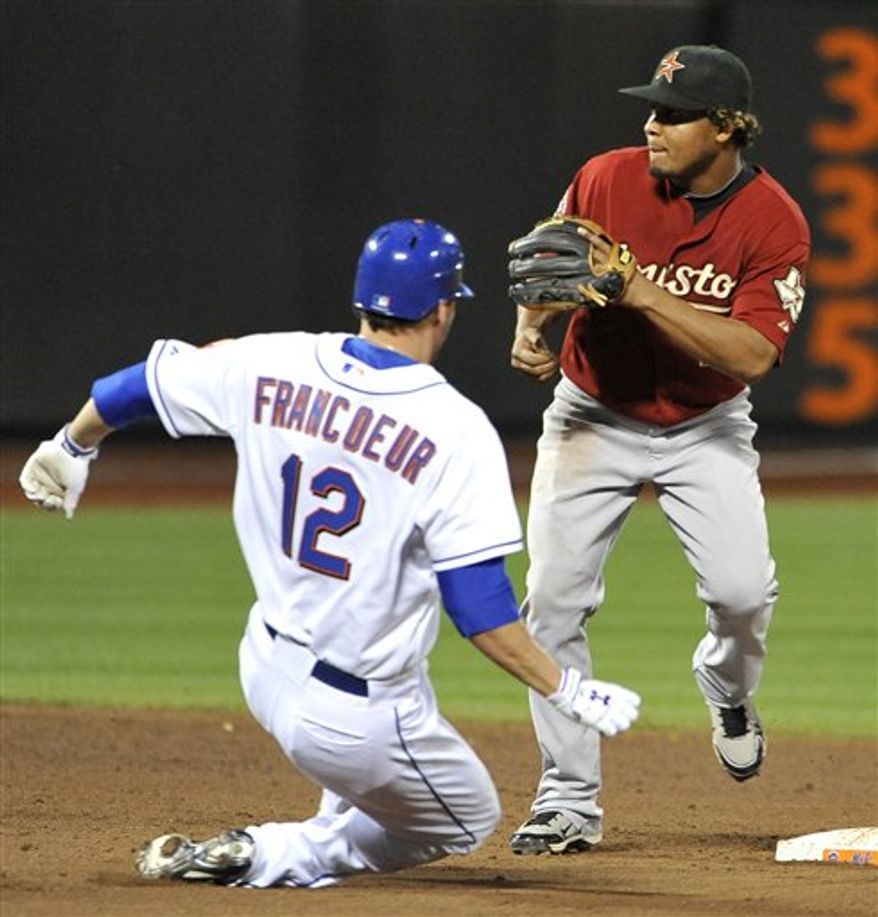 New York Mets' Jeff Franceour beats the throw to Houston Astros' second baseman Anderson Hernandez to steal second base in the sixth inning of a baseball game Friday, Aug. 27, 2010, in New York. (AP Photo/Kathy Kmonicek)