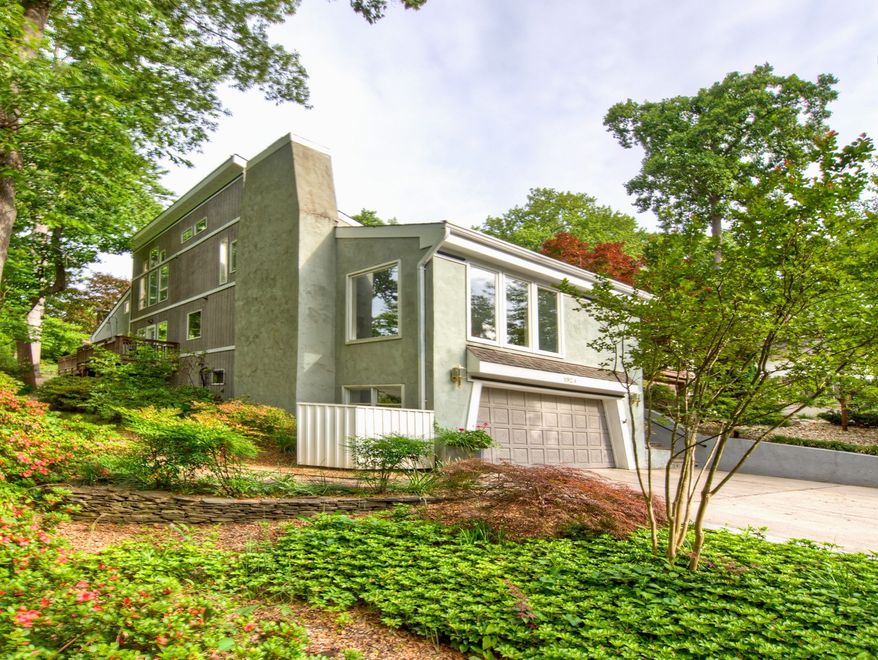 The contemporary-style stucco home at 1924 Rhode Island Ave. is on the market for $949,000. The home has four bedrooms and three full baths.