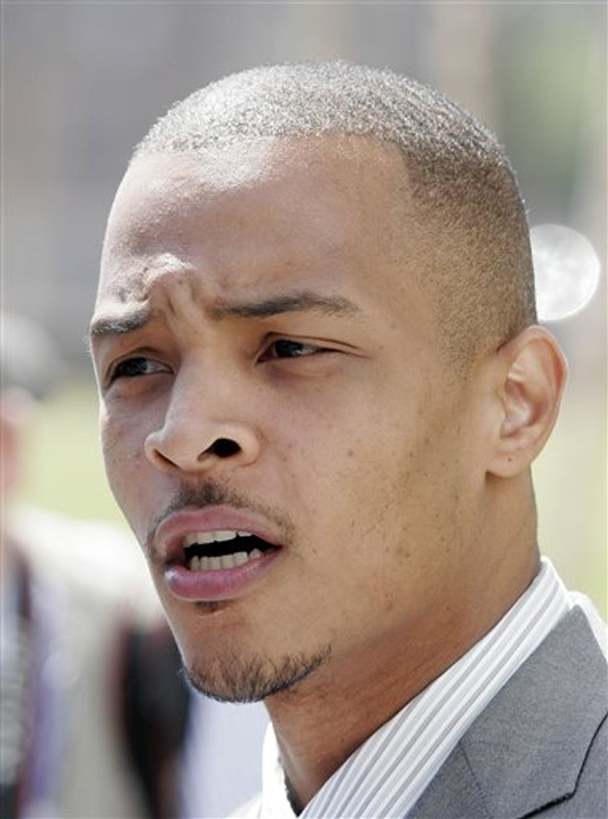 FILE - Rapper T.I. whose real name is Clifford Harris speaks to reporters outside the Richard B. Russell Federal Courthouse in Atlanta, in this March 27, 2008 file photo. Police say Rapper T.I. and wife Tameka Cottle have been arrested in West Hollywood for possession of a controlled substance late Wednesday Sept. 1, 2010. (AP Photo/John Bazemore, File)