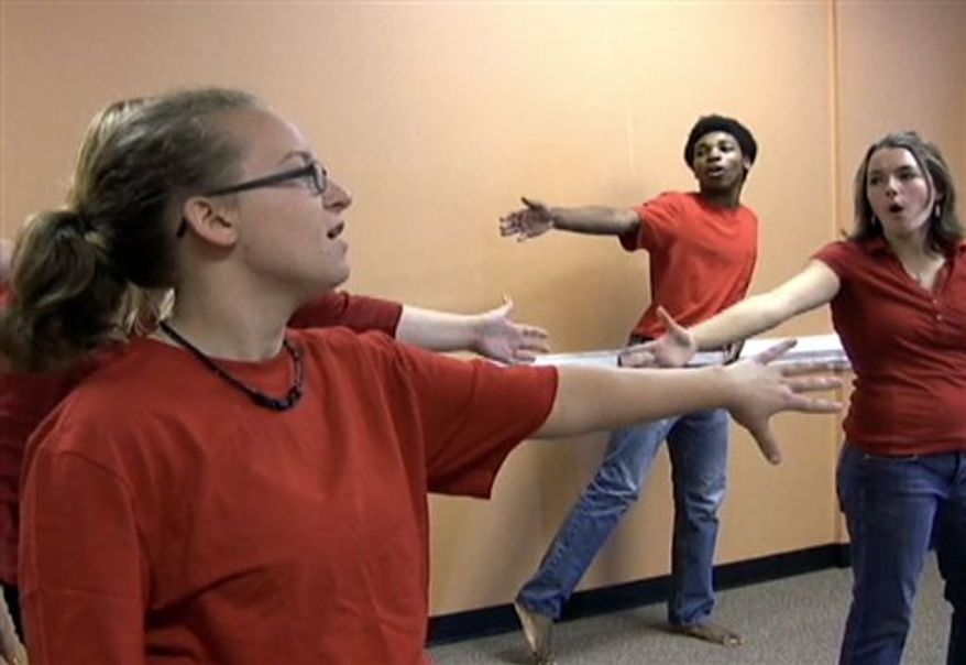 FILE- This file publicity image released by Fox shows, front row from left, Dijon Talton, Lea Michele, Amber Riley, Jenna Ushkowitz and Chris Colfer as they perform in "The Power of Madonna" episode of "Glee," which aired Tuesday, April 20, 2010 on Fox. The Charlotte Academy of Music's first Glee Camp in June sparked so much interest from students eager to replicate what they saw on the hit musical TV show, the academy added a second camp, plus created a Glee Club that started practicing last week. (AP Photo/Fox, Michael Yarish, FILE) NO SALES