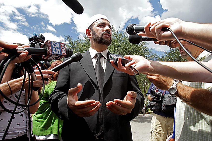 Imam Muhammed Musri, of the Islamic Society of Central Florida, meets with reporters in Gainesville, Fla., Wednesday, Sept. 8, 2010. Musri met with Pastor Terry Jones of the Dove World Outreach Center to try to change his mind about burning of copies of the Quran but Jones plans to go forward as scheduled on Saturday, Sept. 11. (AP Photo/John Raoux)