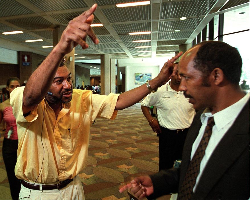 The Washington Times
One-time drug kingpin Cornell Jones, seen here in July 2001, supports one of the two leading candidates for D.C. mayor - but depending on when he was asked, it's not clear which one.