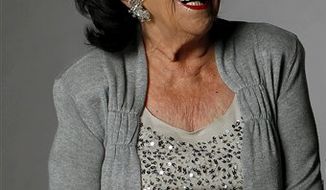 In this July 6, 2010 photo, Wanda Jackson poses for a portrait in Nashville Tenn. (AP Photo/Josh Anderson)
