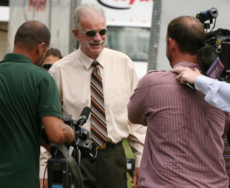 Rev. Terry Jones tells members of the media on Wednesday, Sept. 8, 2010, that he plans to go forward with plans to burn copies of the Koran at the Dove World Outreach Center in Gainesville, Fla. on Sept. 11. (AP Photo/Orlando Sentinel, Stephen M. Dowell)