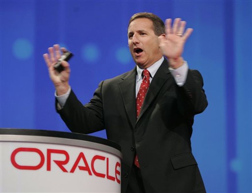 FILE - In a March 3, 2010 file photo then Hewlett-Packard Company Chairman and Chief Executive Officer Mark Hurd speaks at the dedication ceremony of HP's customer service and technical support center in Conway, Ark. (AP Photo/Danny Johnston, file)