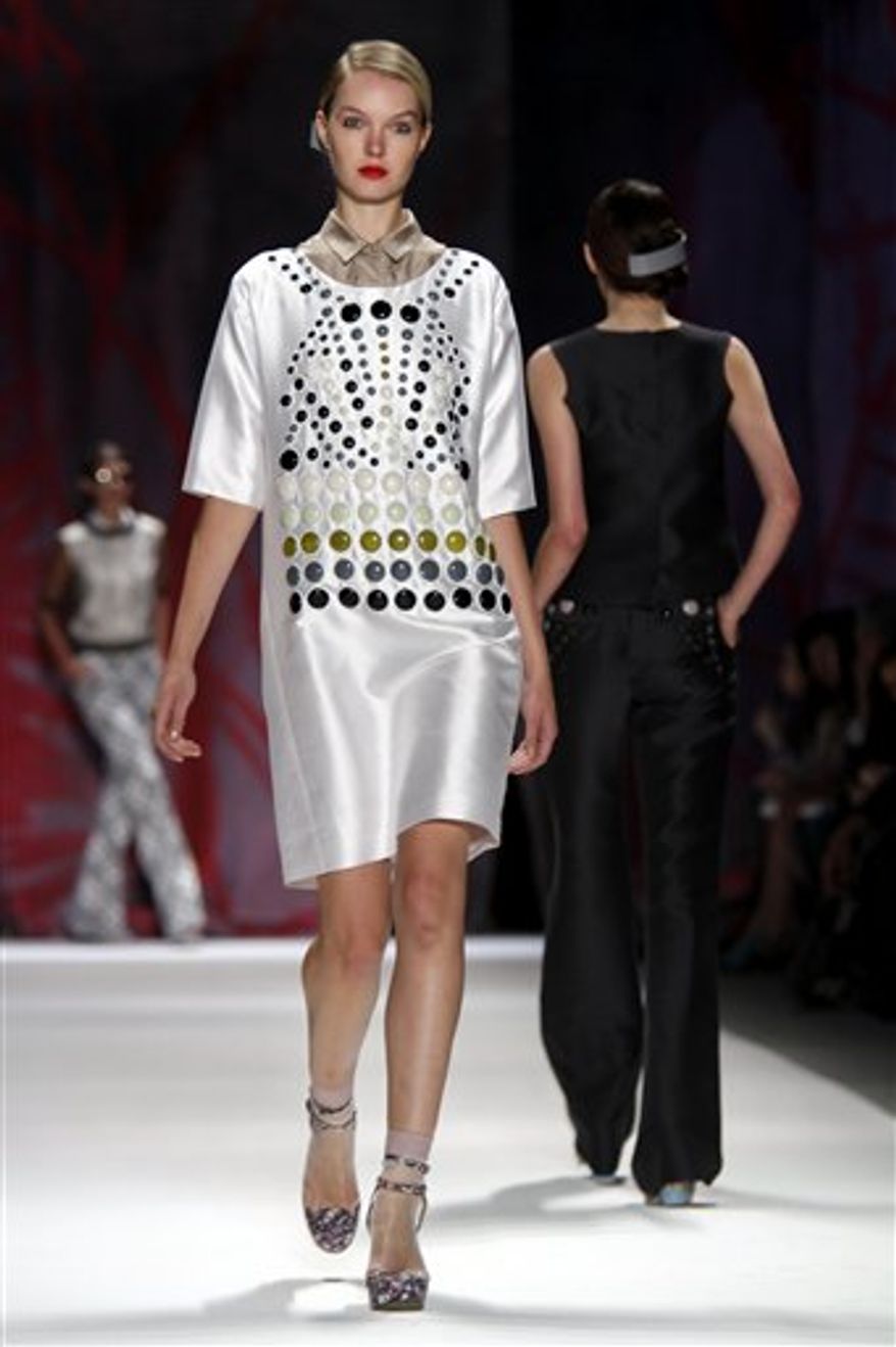 A model wears fashion from the Cynthia Rowley Spring 2011 collection, Saturday, Sept. 11, 2010, during Fashion Week in New York. (AP Photo/Bebeto Matthews)