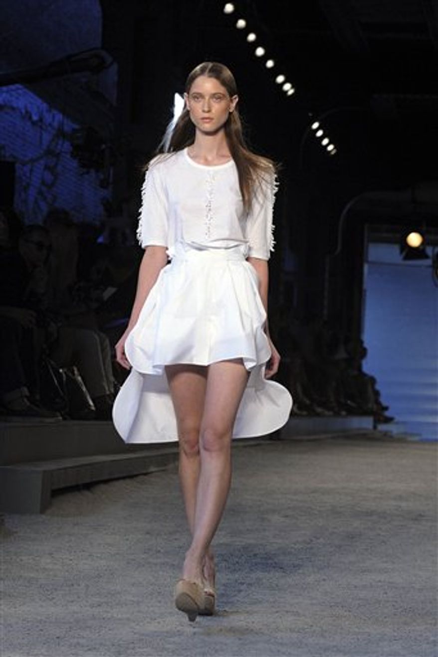 The Edun spring 2011 collection is shown during Fashion Week in New York, Saturday, Sept. 11, 2010. (AP Photo/Diane Bondareff)