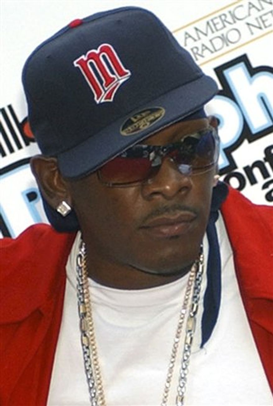 FILE - In an Aug. 2, 2004 file photo, Petey Pablo poses for photos at the Billboard R&B Hip-Hop Awards in Miami Beach, Fla. He is charged with being a felon with a gun and carrying a concealed, stolen weapon. (AP Photo/Alan Diaz, File)