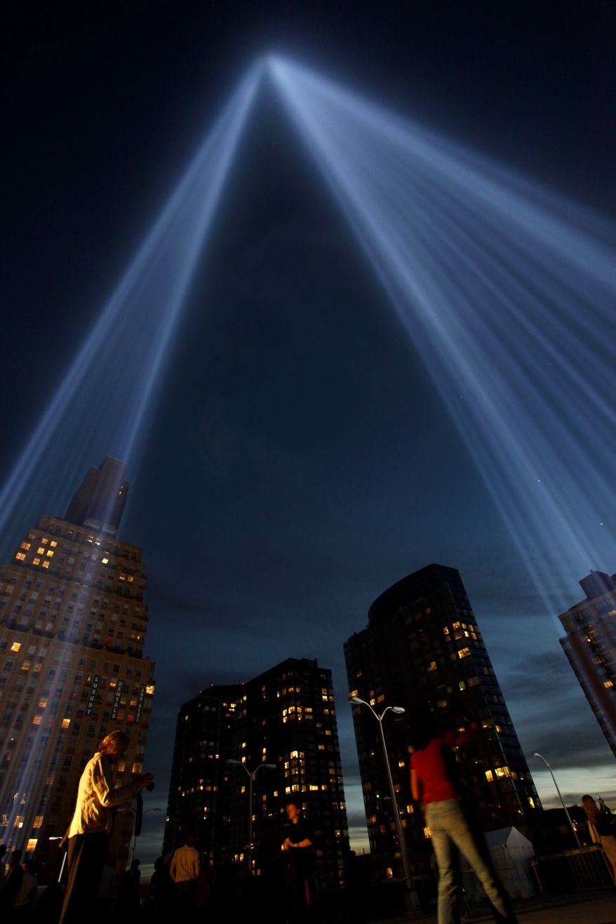 The Tribute in Lights glow skyward near the World Trade Center site, Saturday, Sept. 11, 2010 in New York. (AP Photo/Craig Ruttle)