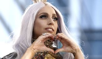 Lady Gaga arrives at the MTV Video Music Awards on Sunday, Sept. 12, 2010 in Los Angeles. (AP Photo/Matt Sayles)