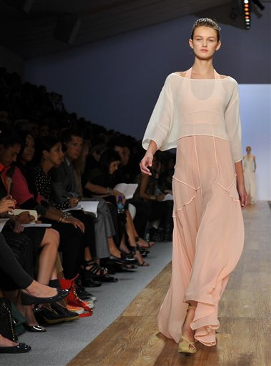 The Max Azria spring 2011 collection is modeled Sunday, Sept. 12, 2010 during Fashion Week in New York. (AP Photo/Stephen Chernin)