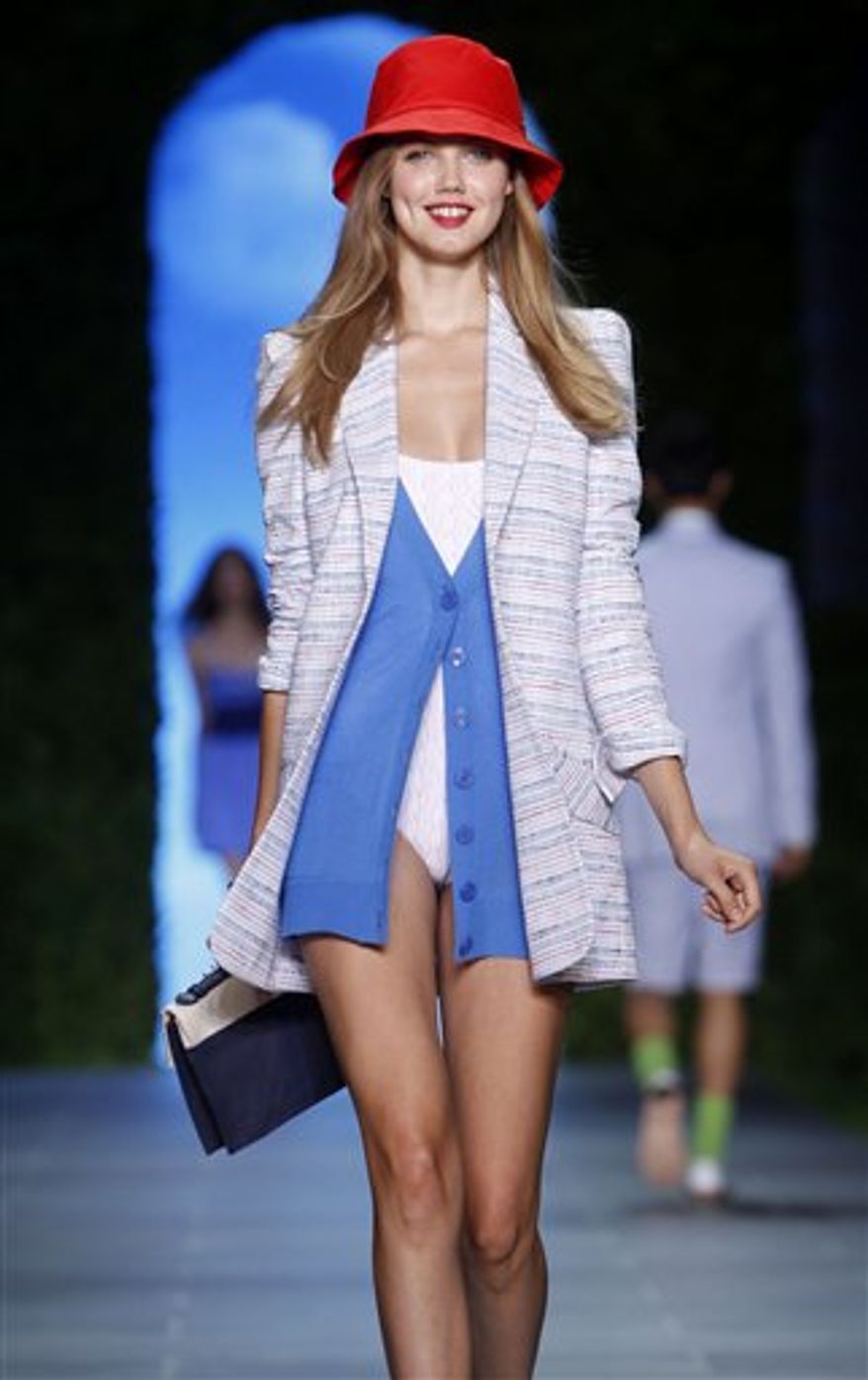 The Tommy Hilfiger spring 2011 collection is modeled during Fashion Week in New York, Sunday, Sept. 12, 2010. (AP Photo/Seth Wenig)