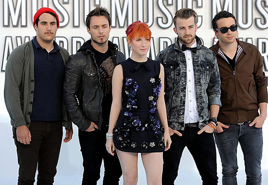 Hayley Williams, center, and Paramore arrive at the MTV Video Music Awards on Sunday, Sept. 12, 2010 in Los Angeles. (AP Photo/Chris Pizzello)