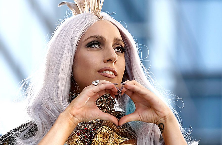 Lady Gaga arrives at the MTV Video Music Awards on Sunday, Sept. 12, 2010 in Los Angeles. (AP Photo/Matt Sayles)