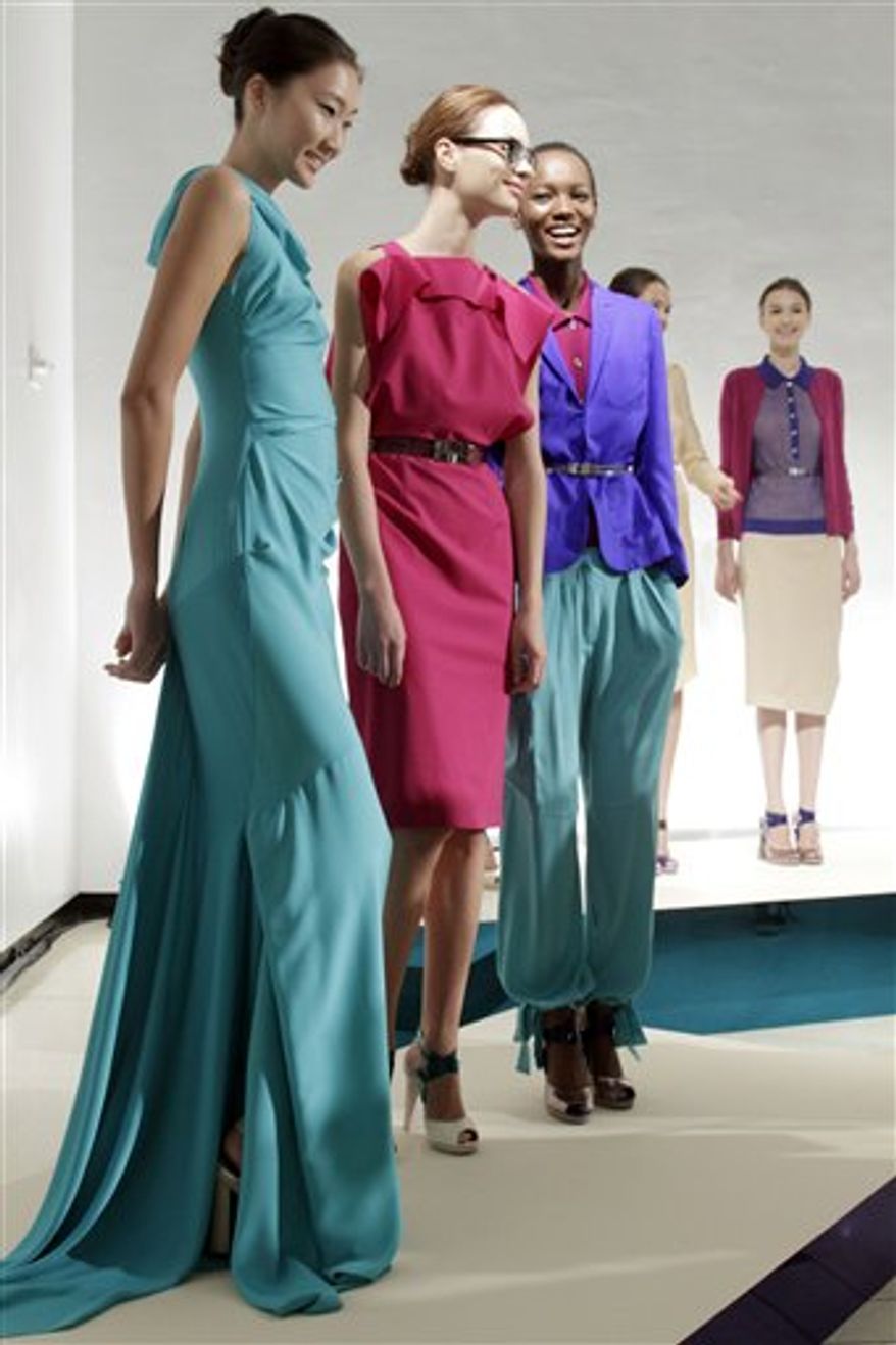 The spring 2011 collection of designer Rachel Roy is modeled during Fashion Week in New York, Tuesday, Sept. 14, 2010. (AP Photo/Richard Drew)