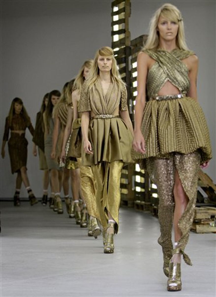 The Rodarte spring 2011 collection is modeled Tuesday, Sept. 14, 2010, during Fashion Week in New York. (AP Photo/David Goldman)